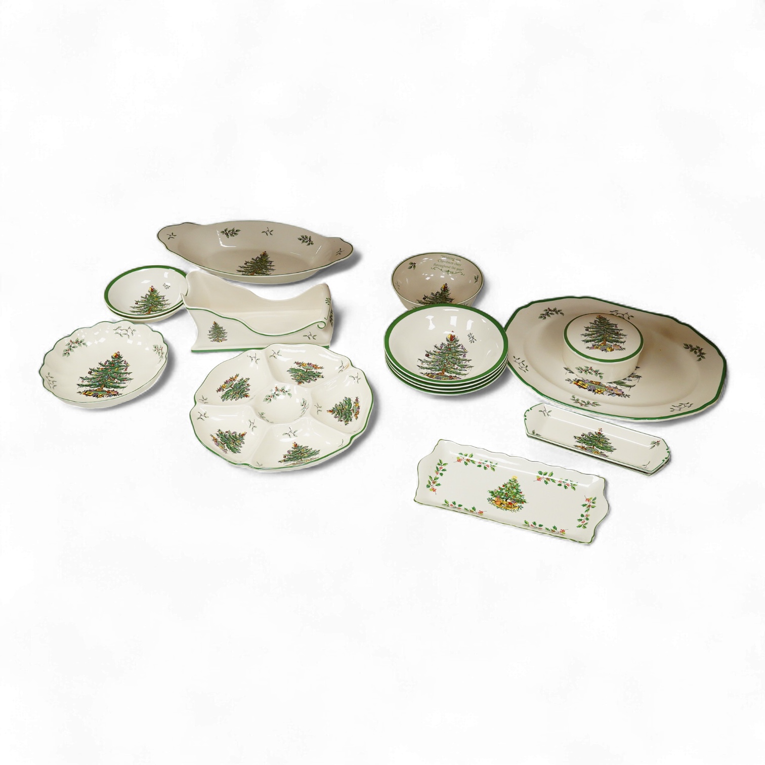 A Spode table service, Christmas Tree pattern. S 3324 to include a set of four bowls, platter and dishes, with some boxes, largest 36cm wide